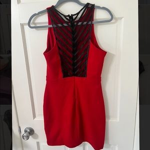 Red semi formal dress with black mesh design